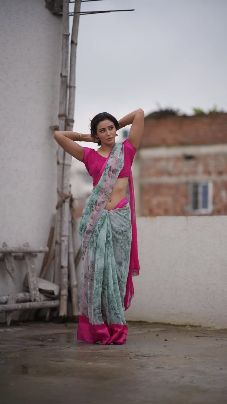 Instagram post by @anairaguptaofficial: 🌦️🌸🫧 🎥 @spr_portraits1922 . . . . . . #saree #rain #fyp #viral