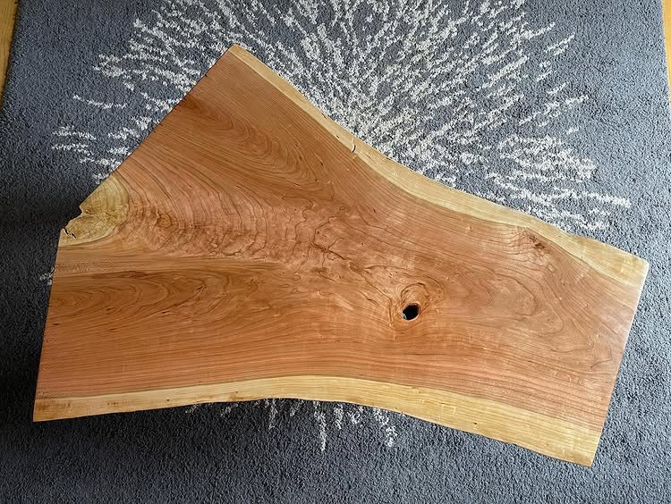 Instagram post by @cbam: The river table went to a new home, but I’m keeping this one. 2” Cherry crotch slab with mortised le…