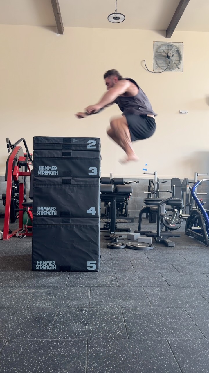 Instagram post by @cbum: Jacked and athletic. Slowly bridging the gap. Apparently a 60 inch box jump was too easy of a goal. …